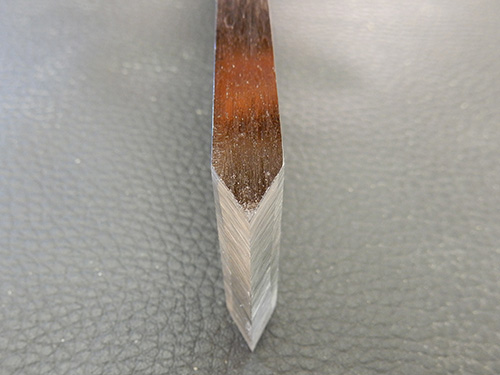 Close-up of freshly sharpened scraper