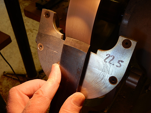 Using grinder to sharpen turning scraper