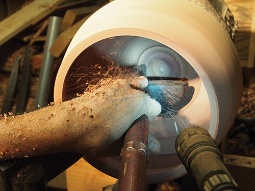 Making cleanup cuts in Hawaiian bowl with bowl gouge