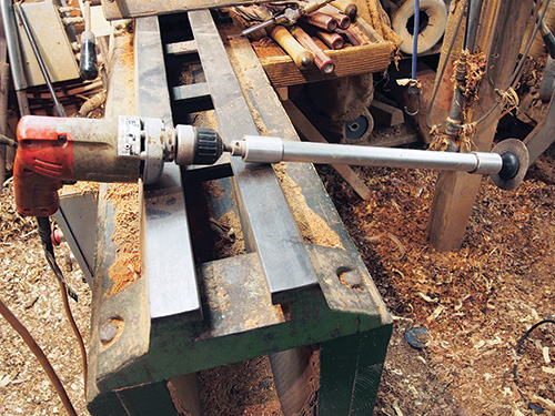 Sander with an extension installed for deep bowl interiors