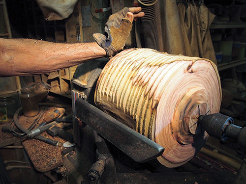 Making adjustments to bowl blank axis at the start of turning