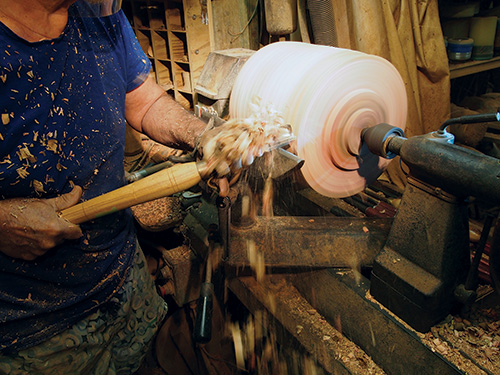 Turning Hawaiian bowl blank with a spindle-roughing gouge
