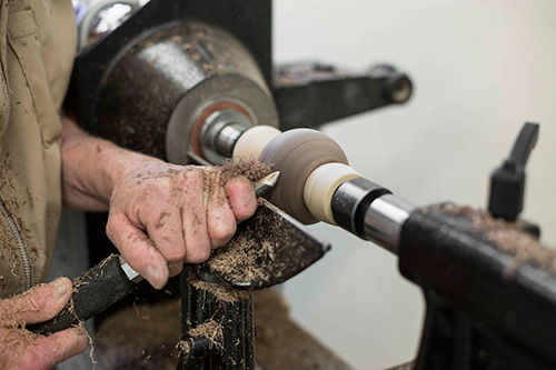 Making upward cuts on a turned sphere