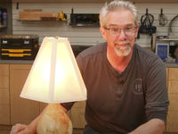 Rob Johnstone showing turned green wood lamp