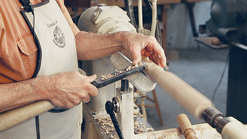 Checking thickness of spindle turning with fingers