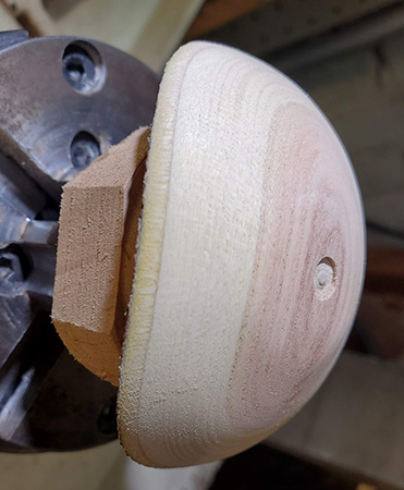 Sanded down tenon on umbrella ornament top