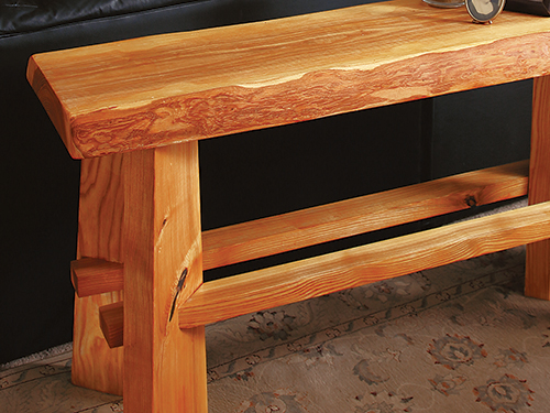 Ash wood bench with wood with a cathedral grain pattern