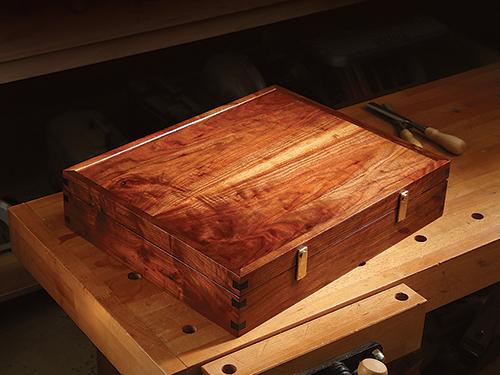 Walnut wood box demonstrating two different wood figures