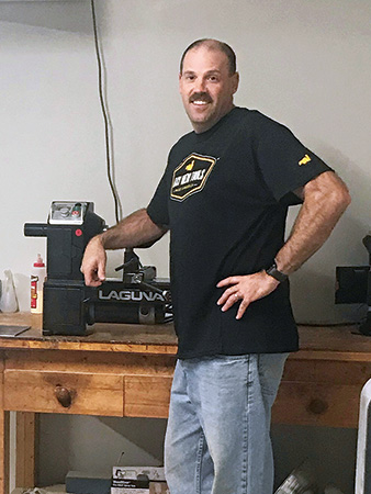 Veteran posing near his Laguna lathe