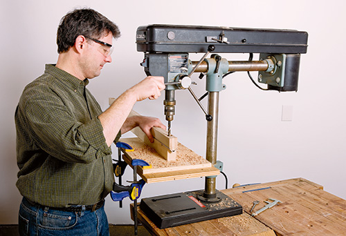 Drilling bolt holes in panel press bars