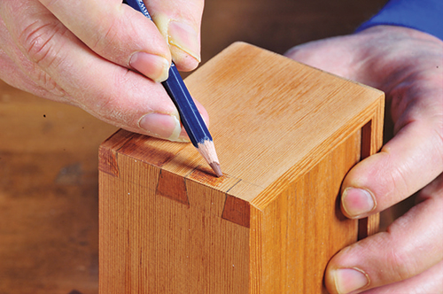 You can even add fake dovetails to a mitered box.