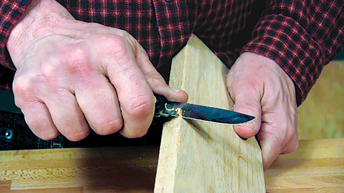 Cutting down board with whittling knife