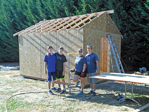 Sandry family constructing a home wood kiln