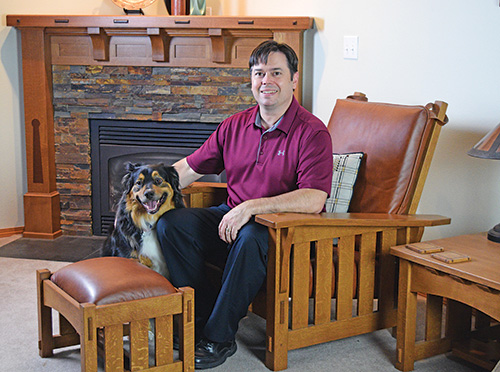 Chair and matching ottoman with installed leather padding