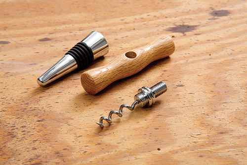 Turned corkscrew handle and metal bottle stopper