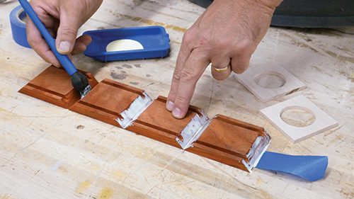 Attaching speaker case sides with painter's tape and glue