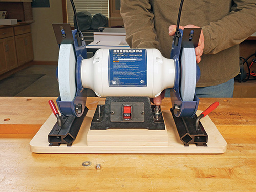 Attaching grinder to grinding jig baseboard