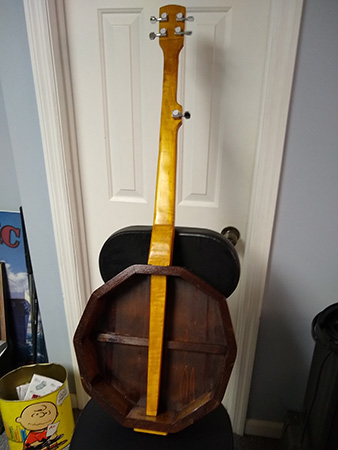 Back view of a wooden banjo