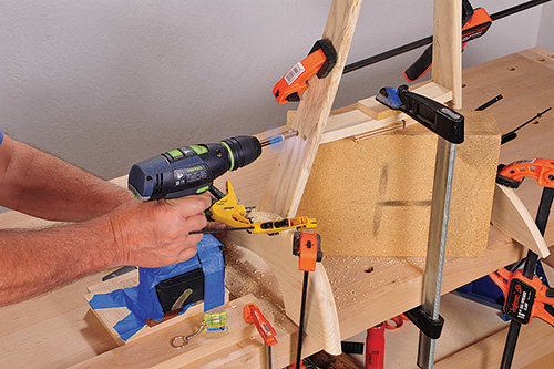 Securing music stand legs to stretcher