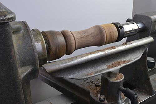 Peppermill blank mounted on a lathe