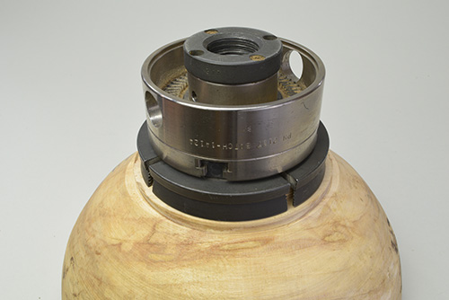 Jaw chuck fit around the base of a bowl