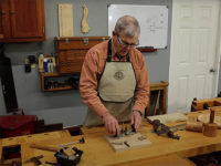 Ernie Conver cutting with a hand router plane