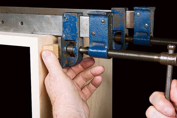 Photo 3: When squaring up a large assembly with a tape measure, get a helper for best results.