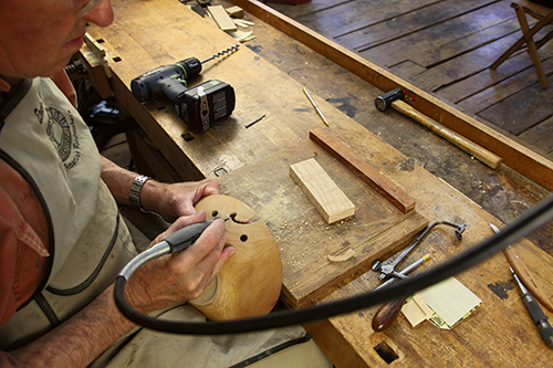 Finally, smooth saw marks and break edges. The author used a Dremel rotary tool.