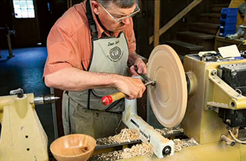 A jam chuck that is faceplate-mounted will allow you to refine the bottom of the bowl to accept the riser base you’ll turn later.