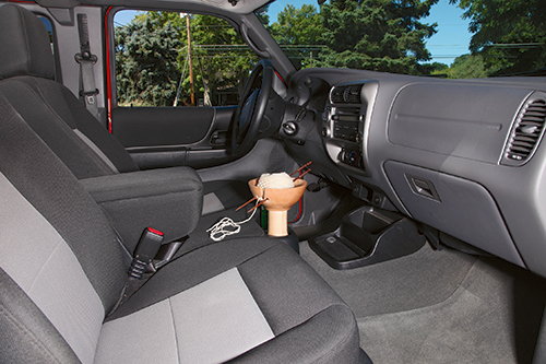 A base that’s perfectly sized to fit into your car’s cup holder will allow the knitter to make effective use of time in the car while keeping the yarn under control.