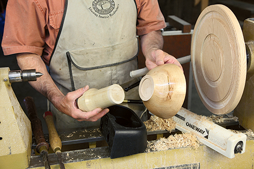 The base is turned separately, as it would be impractical as a bowl-base turning. Test-fit it to your car’s cup holder to be certain that the fit is tight enough to hold well, but loose enough to slide in and out of the hole.