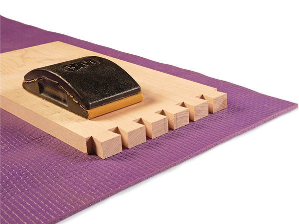 Sanding on top of a yoga mat
