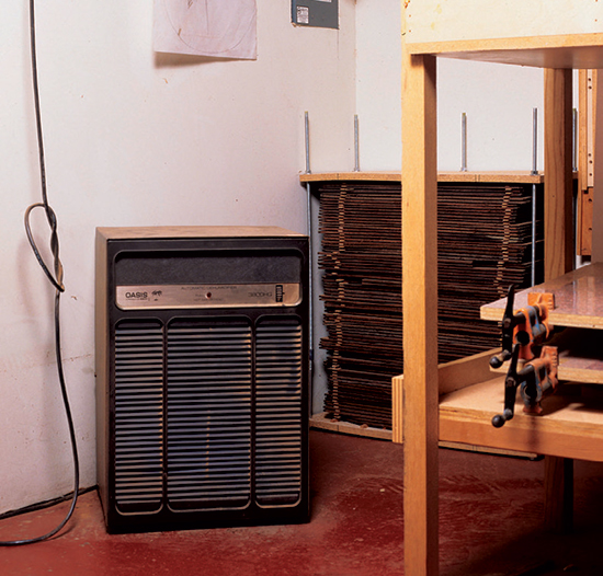 A dehumidifier helps keep a shop's air drier, thus making it feel cooler as well.