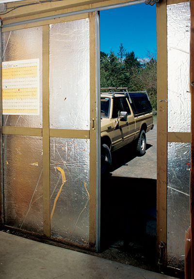 Adding rigid insulation to the inside surface of doors helps keep the shop cool. 