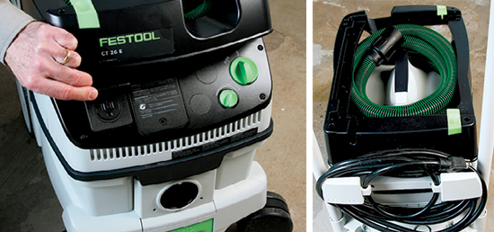 Festool’s CT 26 has its auto-start tool outlet under a hinged access door (left photo). When a power tool plugged into this outlet is turned on, the vacuum starts automatically. The Festool features a hose and cord garage on top of the unit, and it also has a cord wrap on the back (right photo). It’s shown here with the optional handle and tool caddy.