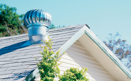 A roof-mounted ventilator turbine allows hot air to escape from the shop’s attic space.