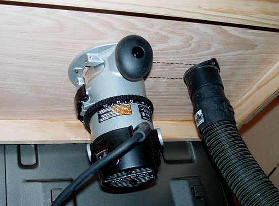 The internal chamber allows a shop vac to draw debris away from close to the router with no hose obstructions above the table.