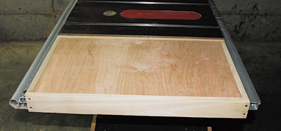Cut a piece of 3/4" birch plywood for the table’s bottom layer. Once set into place, its top surface should be flush with the top of the frame.