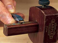 One of your first steps is to set the tips of the mortise gauge spurs to the width of your mortise chisel.