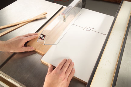 Photo 3: Engage the hook on the end of your material, and use the sled and hook to push the piece past the blade.