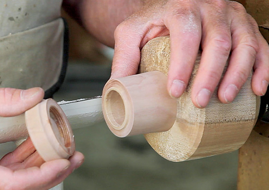 Once a good thread is chased, un-chuck the cap and set it aside. Chuck the body of the box and excavate the bulk of the interior with a spindle gouge; then use scrapers ground to the shape you want the inside to be. Now scrape a short tenon that is a slide fit with the crest diameter (minor diameter) of the interior thread.