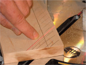 Figure 3. The shape of the rail (where the Shaker pegs will be mounted) is formed from straight lines and 45-degree angle cuts, made here with a chop saw. The exact shape of the rail can be modified to suit the builder.